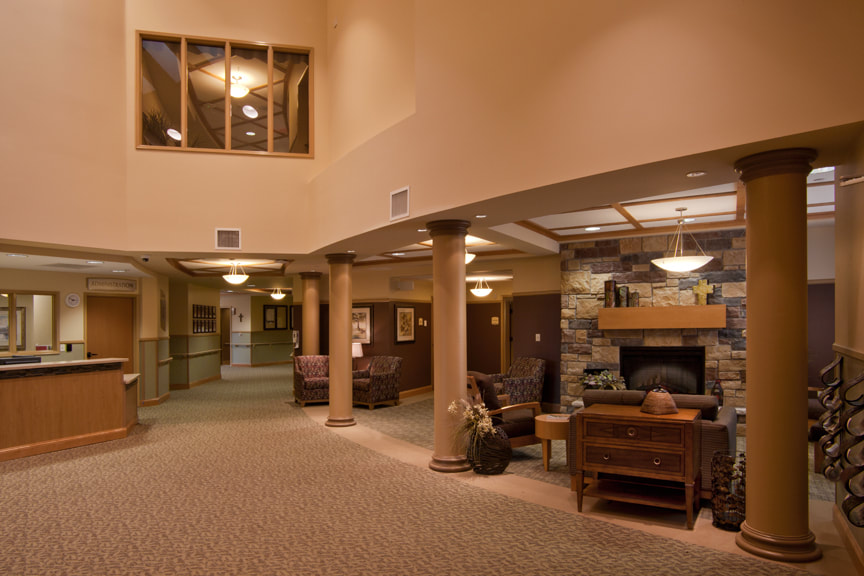 Lobby with Fireplace and Columns